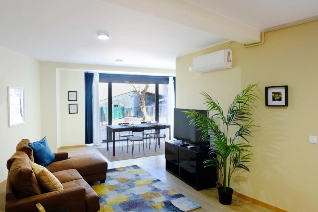 Seia House | Casa do Lagar - Casa inteira com 2 quartos, sala, cozinha e pátio privado
