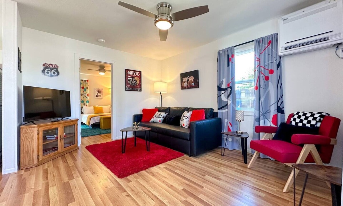 Coalinga House | Escape to our cozy, retro-inspired haven in Coalinga, just minutes from the town center. Perfect for business or leisure, this vibrant home comfortably accommodates guests with a queen pull-out couch.