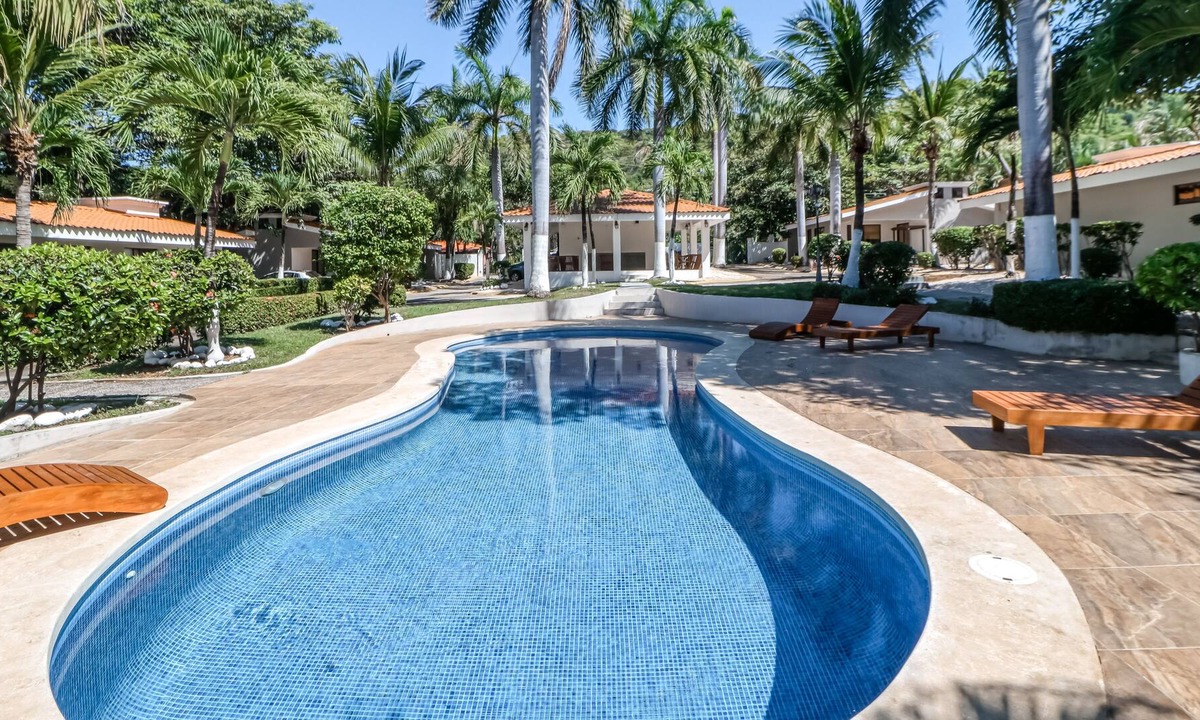 Coco Apartment | Ground-Floor Getaway w/ Free WiFi, Step-Free Access, & a Shared Pool