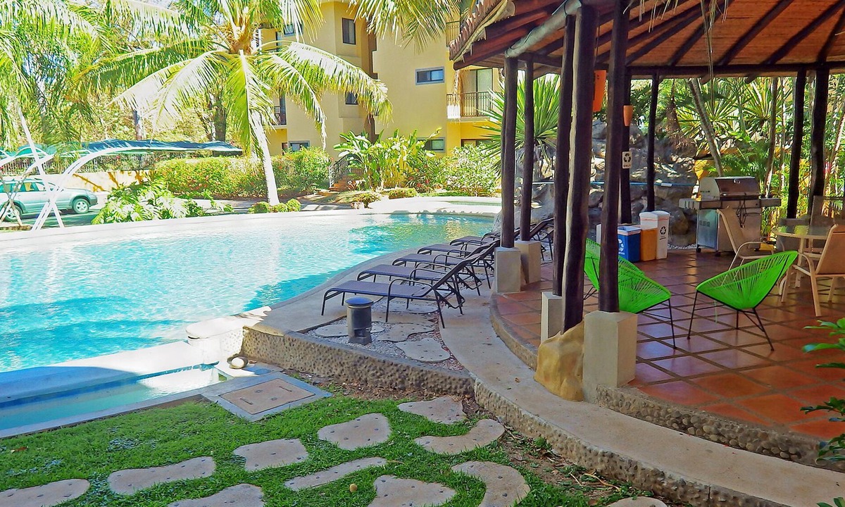 Tamarindo Condo | Just. Wow. Remodeled First Floor with Private BBQ and Patio Just Steps to Pool