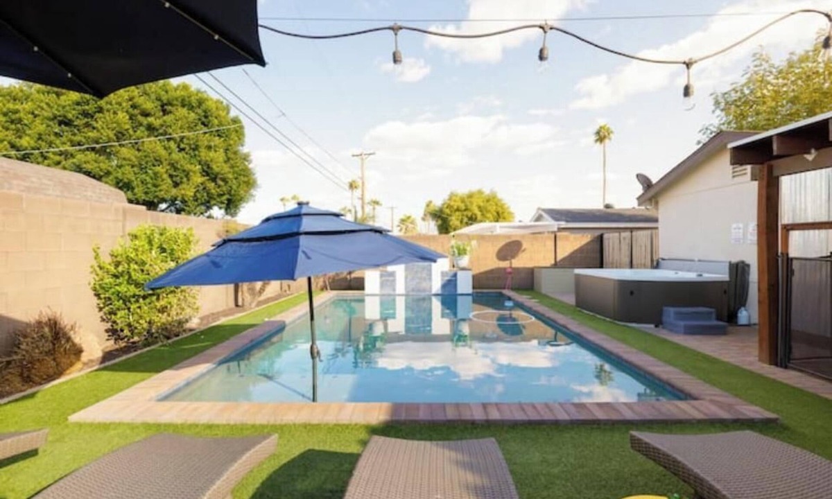 Papago Parkway House | Rancho Relaxo: Dog friendly! Enjoy heated pool, hot tub, pool table, outdoor TV!
