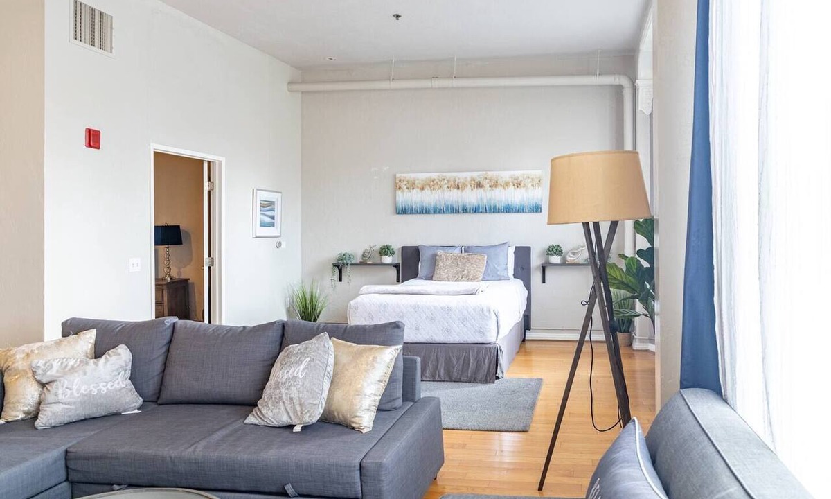 Gaslamp Quarter Hotel | Spacious 1 BR 700 sq ft loft suite with free parking, steps to the Convention Center and Gaslamp dining. Ideal for business or group travel.