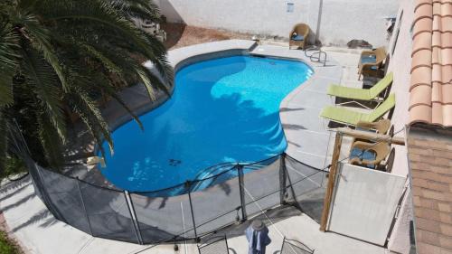 North Las Vegas House | Sunny Pool Retreat-Sleeps 11- RV Parking