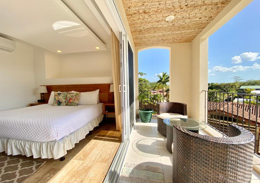 Playa Langosta Apartment | Tropical Luxury 2Bdr condo - Pool view - At the Beach