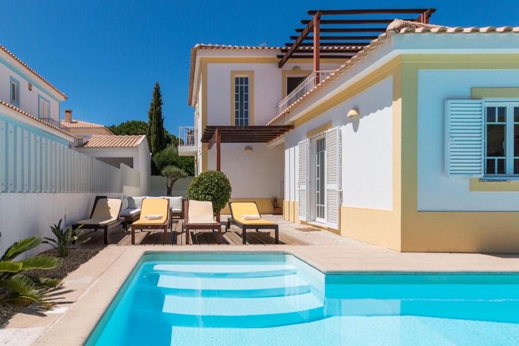 Meco Villa | Yellow house