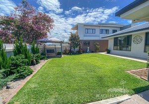 4 bedroom wide-waterfront home with pool and skyline views