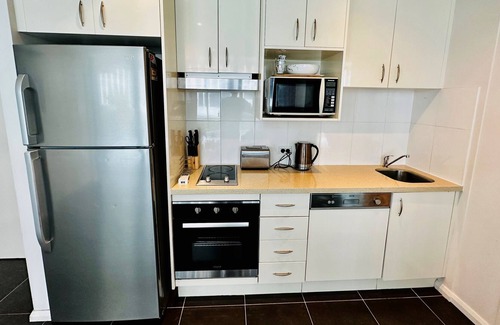 Southport Apartment | Enjoy Cozy Comfort and Modern Convenience in our Perfectly Equipped Apartment