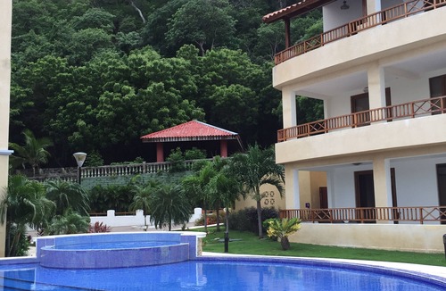 San Juan del Sur Condo | 2 bed 2 bath, full kitchen, OCEAN FRONT, balcony A/C, pool, internet, cable TV