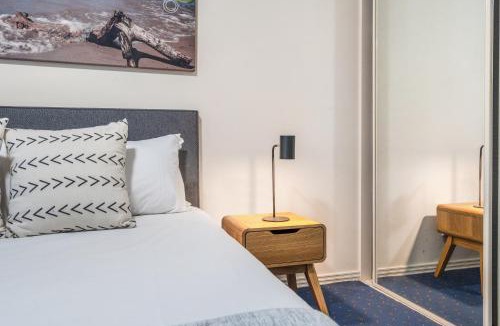 Mermaid Beach Apartment | 2-Bed Family Haven with Pools, BBQ & Playgrounds