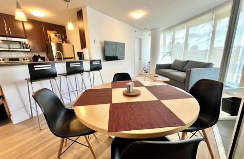 Crosstown Apartment | 2BR+Sofabed, 2Bath, Private 500sqft sundeck, EV Parking w/Pool, Sauna, Hot Tub