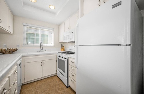 West Newport Apartment | 3BR Home Steps from Shops, Pier and Beach