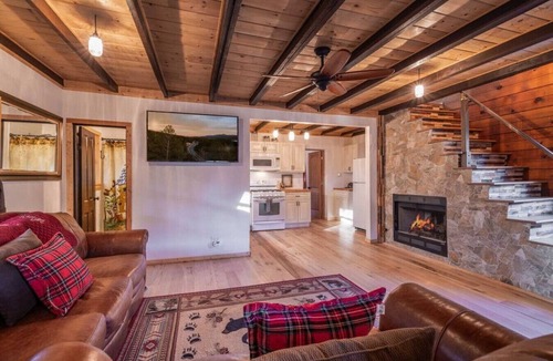 Woodlands Cabin | A Tin Hut with hot tub and fireplace