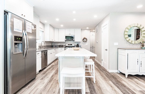 West Newport House | Beach House for Family Trips to the Coast, Steps to Sand with A/C and Sunny Patio