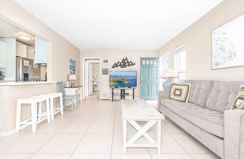 West Newport Condo | Beach House for Family Trips to the Coast, Steps to Sand with A/C and Sunny Balcony