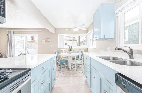 West Newport Condo | Beach House for Family Trips to the Coast, Steps to Sand with A/C and Sunny Balcony