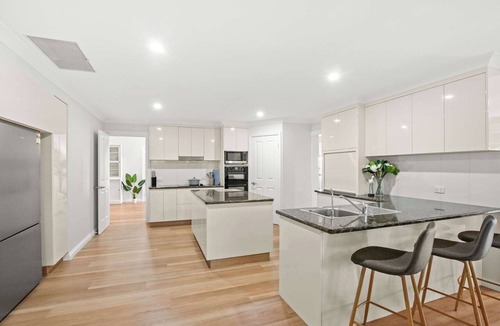 Banksia Beach House | Bribie Waterfront Retreat - Pontoon, Pool & Kayaks