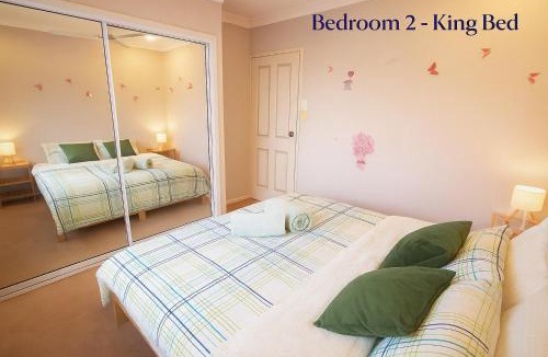 Banksia Beach House | Canal View Holiday-2Rooms-Guests Usable 120m2-Host Shared Property-No Tax Invoice