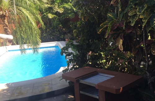 Playa Hermosa House | Casa Luarca. Beach front villa with private pool surrounded by tropical gardens