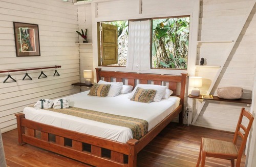 Cocles Villa | Cocoa Jungle Art Villa: 8 minute drive to Cocles Beach. Flat rate no hidden fees
