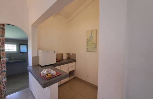 Tamarindo House | Colibri room for two or three with pool and rancho kitchen