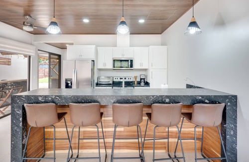 Pinilla House | Contemporary home with shared pool, fire pit, and internet
