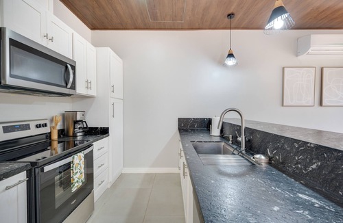 Pinilla House | Contemporary home with shared pool, fire pit, and internet