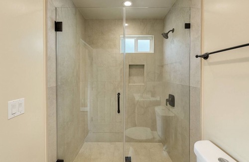 Lawndale House | Cozy Playhouse Retreat with Private Yard & Theater Lounge