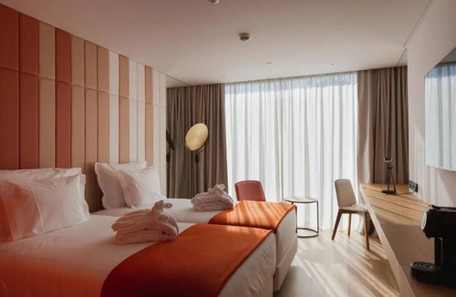 Sao Jorge de Arroios Hotel | Dive into Lisbon Nights: Rooftop Pool & Magical Light Show Views