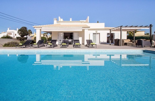 Estombar Villa | Elegant Carvoeiro Villa | Casa do Coracao | 4 Bedrooms | Distant Sea Views