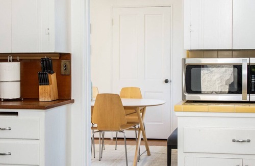 West Beach Apartment | Enjoy indoor-outdoor living, a full kitchen and walk to beach and state st.