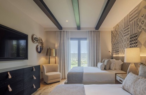Tor Hotel | Experience Comfort & Style in a Mountain-View Room Perfect for Relaxation