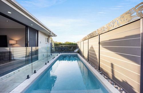Gold Coast House | Immerse in the ultimate family getaway at our Burleigh Heads haven, where comfort meets charm!