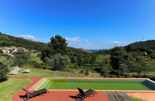 Ferraria de Sao Joao Cottage | Independent studio house with panoramic terrace in mountain village.