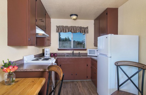 South Lake Tahoe Resort | Lakeview Lodge Room: 2 Queen Beds, Full Kitchen & Gas Fireplace | Private Beach