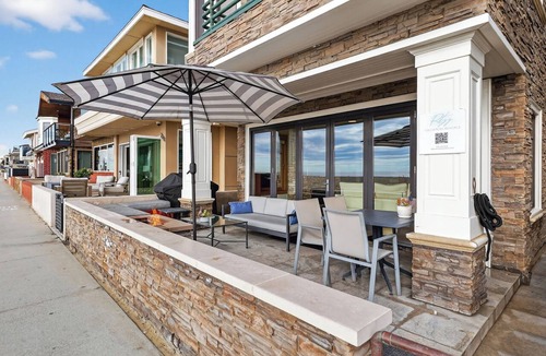 West Newport House | Luxury Oceanfront Home with Rooftop Deck, Hot Tub, Fire Pit