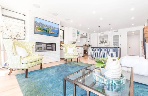 West Newport Condo | Luxury Three-Level 6BR | AC, Ocean Views & Rooftop Deck w/Private Hot Tub | Steps to the Sand!