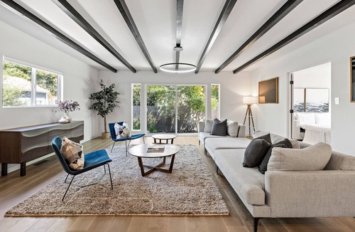 North Central House | Modern 4-Bedroom Masterpiece with Indoor Fireplace