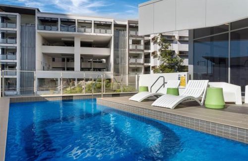 Bowen Hills Apartment | Modern and Stylish Apt with Large Balcony and Parking!