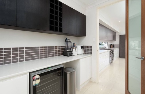 Biggera Waters House | North Quay Waterfront Family Holiday Home + Pool