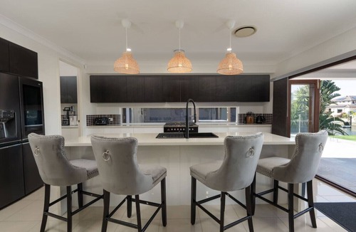 Biggera Waters House | North Quay Waterfront Family Holiday Home + Pool