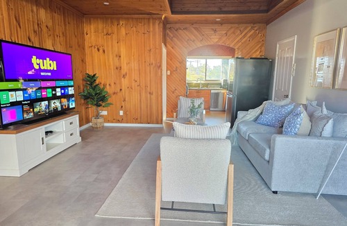 Canley Vale House | Peaceful spacious home with tranquil gardens and alfresco dining zones for year-round enjoyment