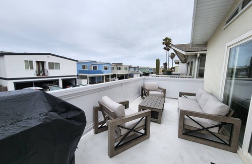 Santa Ana Heights House | Peek-A-BOO ocean view. 50 Steps to the Sand Large Remodeled Beach House.