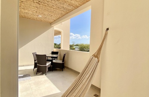 Playa Langosta Apartment | Peninsula 9 ⛱ Tropical Lux ⛱ 2Bdr condo⛱ Pool view⛱ At the Beach ⛱ Playground