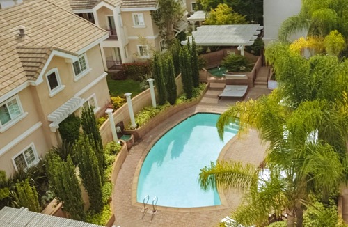 Sunnyvale West Hotel | Premier Fireplace Suite King at The Grand Hotel, Onsite Pool, Free Parking