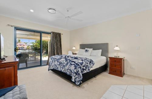 Banksia Beach House | Relaxation & Space in a Canal Home