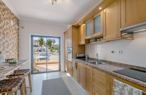 Porto de Mos Apartment | Relaxing two-bedroom luxury modern apartment with mature garden.