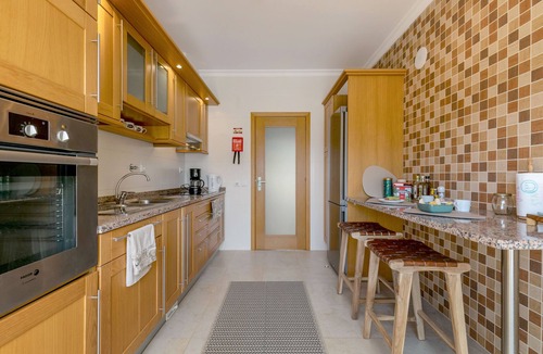 Porto de Mos Apartment | Relaxing two-bedroom luxury modern apartment with mature garden.