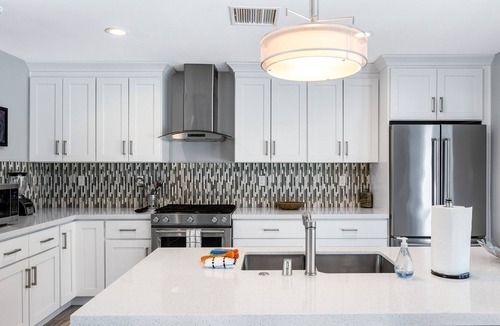 Racquet Club South House | Remodeled Gem with Pool, Hot Tub, Fire Pit, Grill & Putting Green