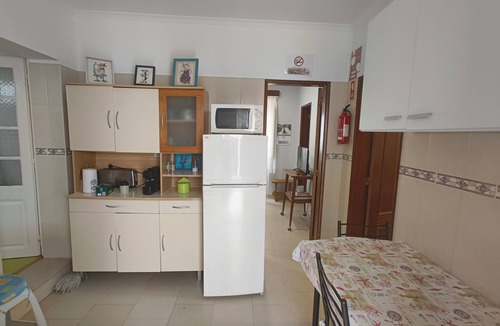 Nazare Apartment | Rustic house featuring traditional Portuguese handicrafts