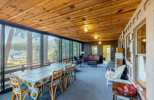 Bass Lake Cabin | Rustic, lakefront cabin with private dock, beach, screened porch & great view